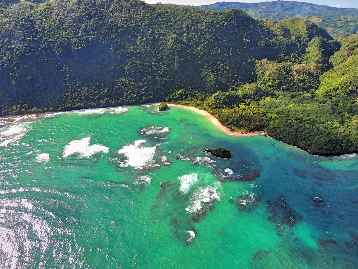 Turquoise lagoon and reef near the Samaná coastline